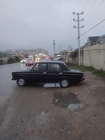2106 qapilari: VAZ 2106 sedan, qara rəng. - Kuzov: 4 qapılı klassik “şestorka” gövdə — 5