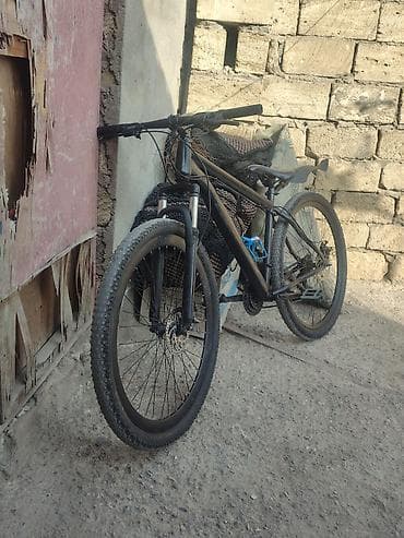 Dağ velosipedi – 29” təkərlər, disk əyləclər, amortizatorlu ön çəngəl