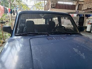 niva şit: LADA Niva 4x4, mavi rəng, 5 qapılı universal kuzov. Xüsusiyyətlər: - — 6