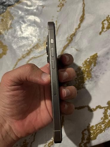 xacmaz iphone: IPhone 15 Pro, 128 GB, Natural Titanium, Simsiz şarj, Face ID — 4