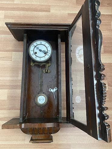 dini divar saatlari: Divar saatları, Mexaniki, Mayatnik — 2