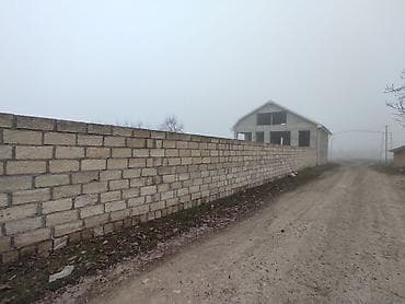 ev bag alqi satqisi: Satılır: yüksək hasarla əhatələnmiş torpaq sahəsi və yarımçıq tikili — 1