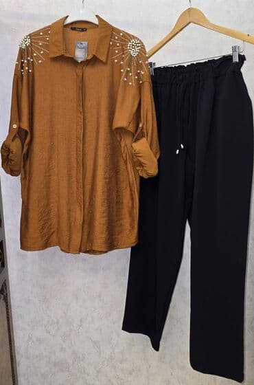 Qadın köynəyi – incə bəzək daşılı, uzunqol, rahat kəsim - Model