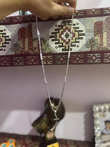 Qol saatları və aksesuarlar: Boyunbağı, Ünvandan götürmə — 2