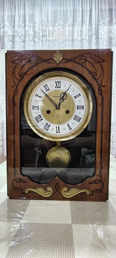 islenmis generator satisi: Divar saatları, Mexaniki, Mayatnik — 4