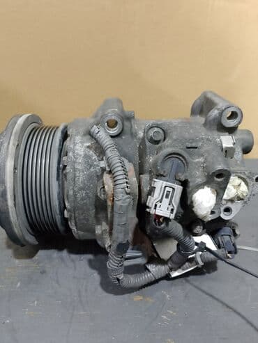 оригинальные запчасти тойота: İşlənmiş avtomobil kondisionerinin kompressoru. Bu kompressor — 1