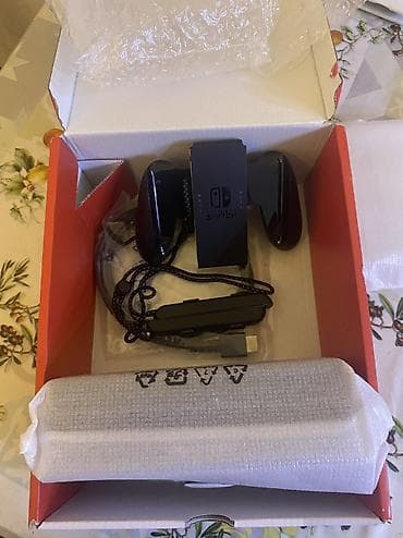 Nintendo Switch Oled 64 GB az işlenmiş üstünde iki dene 70 manatlıq — 3