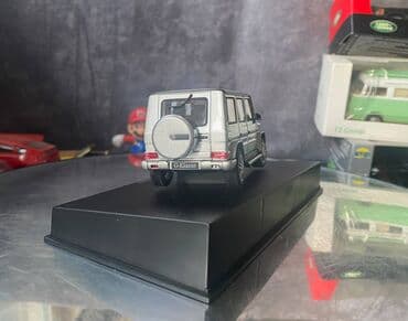 metbex tavan modelleri: Коллекционная модель Mercedes-Benz G-class W463 silver 2012 AutoArt — 18
