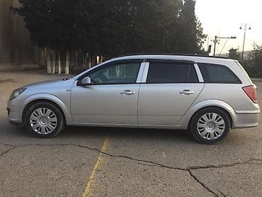 audi a4 ehtiyat hisseleri: Opel Astra Caravan (universal) – gümüşü rəng - Kuzov: universal — 3