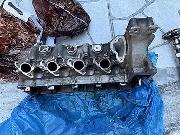 daewoo avtobus satilir: Məhsul: Daxiliyanma mühərriki üçün silindr başlığı və eksantrik val — 9