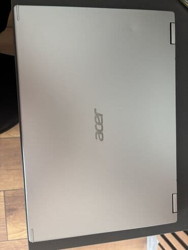 Printerlər: Acer noutbuku – gümüşü korpus, yüngül və nazik dizayn. Acer Prosesor — 1