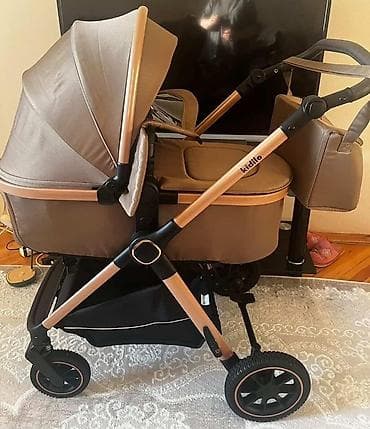 Mimi Kidilo kalyaska 110 azn yenidir qış çxolu, çantası var butun