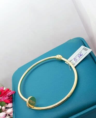 qaş sabitləyici: Bilərzik, Cartier, Sarı qızıl, 750 Əyar, 1578 g — 2