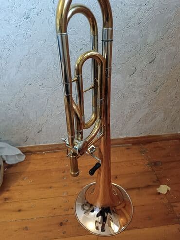 купить бу гитару: Bu, mis nəfəs alətləri qrupuna aid olan, sürüşmə mexanizmi sayəsində — 2