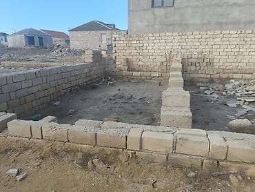 islenmis unitaz satilir: Satılır: tikinti üçün daş materialı və yarımçıq bünövrə/karkas - — 3