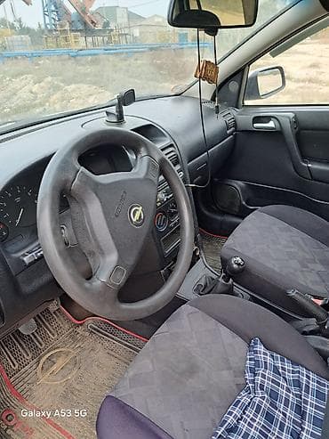 opel vektra 1995: Opel Astra G sedan/hetçbek, gümüşü rəng. - Mühərrik: ECOTEC benzin, 4 — 6