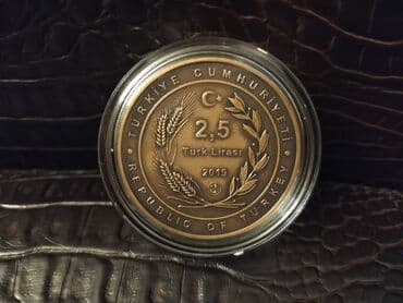 9 dollar nece manatdir: Бронзовая монета (оксид) İmadəddin Nəsimi 650 лет, 2,5 турецких лир — 2