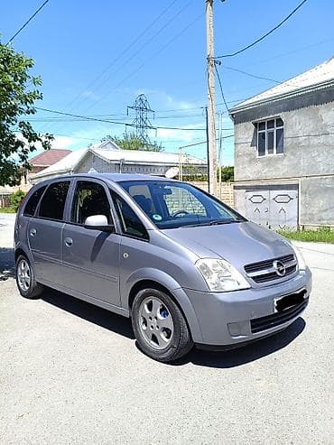15 lik disklər: Opel Meriva: 1.4 l | 2005 il 400000 km Van/Minivan — 2