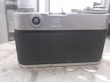 Фото и видеокамеры: SSRİ istehsalı olan və lentlə işləyən FED 3 fotoaparatı. Təbii dəri — 4