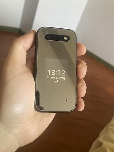 azercell modem satilir: HMD flip telefon Xüsusiyyətlər: - İki ekranlı dizayn: xarici saat/ — 1