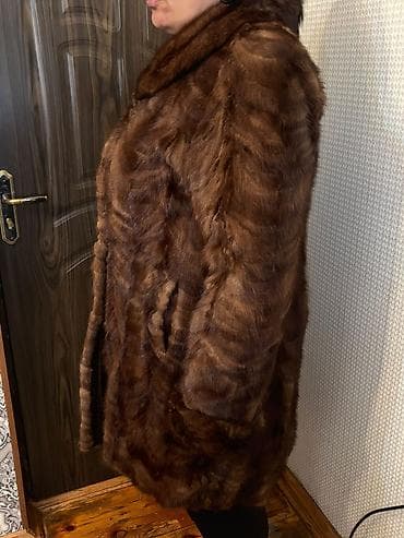Kürklər: Norka Qadın kürkü – qəhvəyi rəngli, uzunsov kəsim - Material: təbii — 1