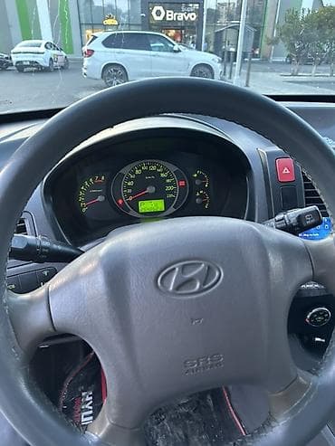 Hyundai Tucson: 2 л | 2005 г. Кроссовер — 4