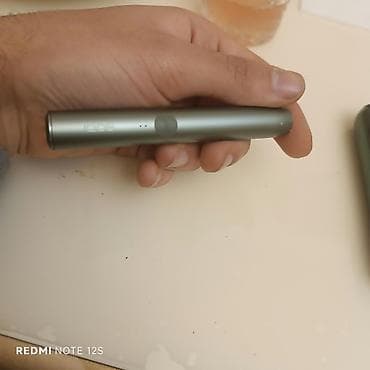 acki sekilleri: IQOS elektron tütün qızdırma cihazı – yaşıl rəng Xüsusiyyətlər: - — 2