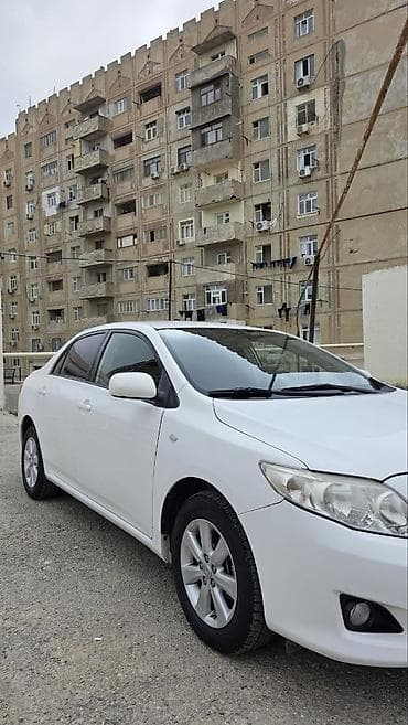annaite teker: Toyota Corolla XLE/LE sedan – ağ rəng, 4 qapılı, ön/yan aerodinamik — 2