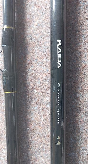 qara canta: KAIDA Archer 390 – 3 hissəli surf qamış. Kaida Carlos 8000. Üstündə — 5