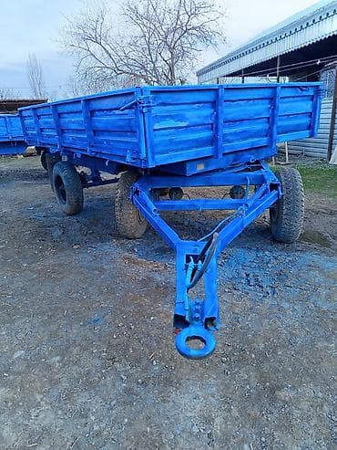traktor 82 satisi az: Traktor qoşqusu – 2 oxlu, yanları açılan metal bortlu yük platforması — 5