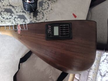 ucuz gitara satisi: Elektro saz – quraşdırılmış preamp və tuner ilə. Xüsusiyyətlər: - — 1