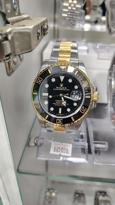 bil: Rolex saat kolleksiyası – vitrində təqdim olunan modellər: - Rolex — 9