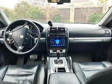 mitsubishi lancer evolution: Porsche Cayenne (1-ci nəsil) – gümüşü rəngdə premium SUV. İli 2008 — 9