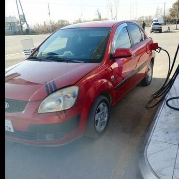kia sportec: Kia Pride: 1.5 l | 2006 il Sedan — 9