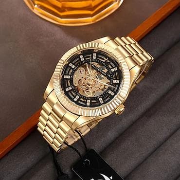 RICECCO mexaniki qol saatı – skelet dizaynlı, qızılı rəngdə lüks