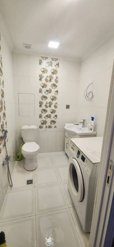 Azadliq metrosuna yaxin 7-ci mikrarayonda 18 mertebeli binanın 10-cu — 9