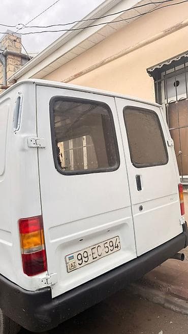 Транспорт: Ford Transit: 1 л | 1999 г. 2000 км Минивэн — 2