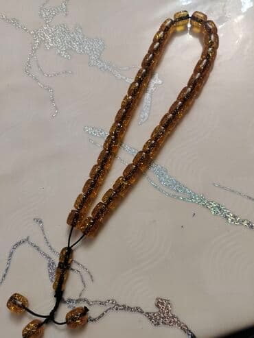 xari bulbul simvolu: Təsbeh satılır — 2