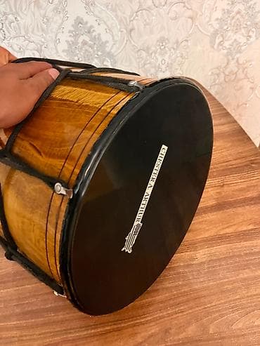 darbuka satış: Temiz qoz ağacindandi matreali,Mikrafonuda varOzu ise agir ve ele — 1