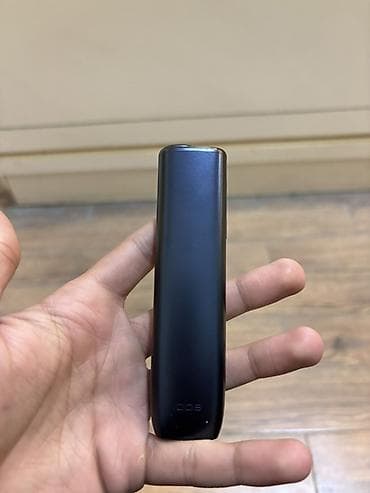 IQOS elektron tütün qurğusunun şarj (charging) qutusu - Rəng: qara -