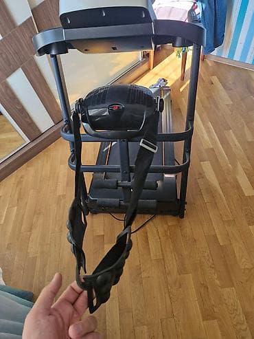 ems trainer: Evdə idman üçün nəzərdə tutulmuş qaçış bandı. Bu cihaz qara rəngdədir — 2