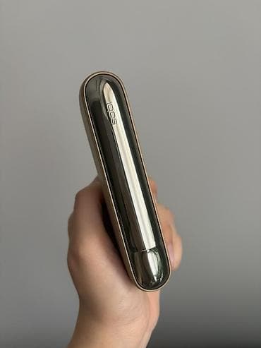 IQOS cihazı – tütün çubuqlarını yandırmadan qızdıran elektron sistem