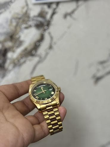 rolex orginal: Saat Hediyye olaraq alinib. Beyenilmediyi ucun satilir . Qiymetde cuzi — 2