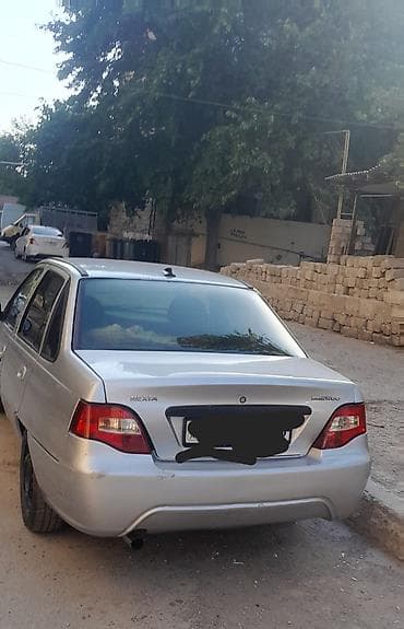 Транспорт: Daewoo Nexia: 1.6 л | 2010 г. Седан — 2