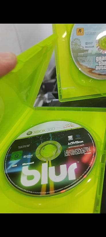 Video oyunlar və konsollar: Xbox 360 iki pult 5 oyun disk və 7 oyun icinde yazılı ela — 5
