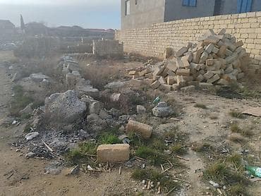 islenmis unitaz satilir: Satılır: tikinti üçün daş materialı və yarımçıq bünövrə/karkas - — 2