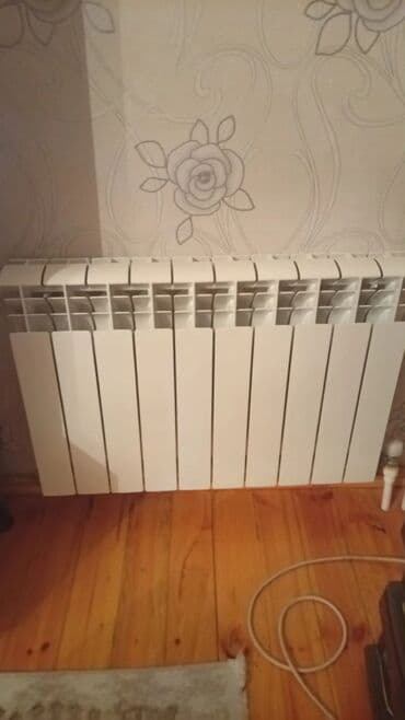 irshad telecom gence filiali: Qaz kombi sistemi və radiator razilasmayla - Divara quraşdırılan NEVA — 3