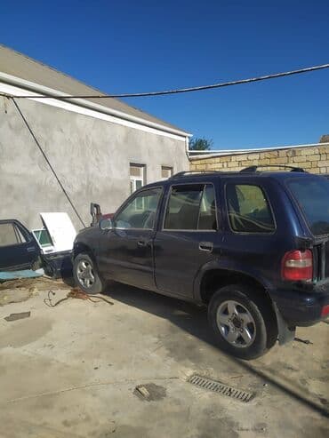 купить мопед бу: Kia Sporteg, 2 л, Бензин, 2000 г., Б/у — 5