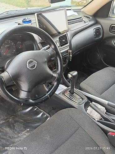 priora qapi: Nissan Sunny: 1.3 l | 2008 il Sedan — 5