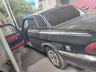 opel tigra 2005: GAZ Volga 3110, qara rəng, sedan kuzov. Xüsusiyyətlər: - Klassik xrom — 2